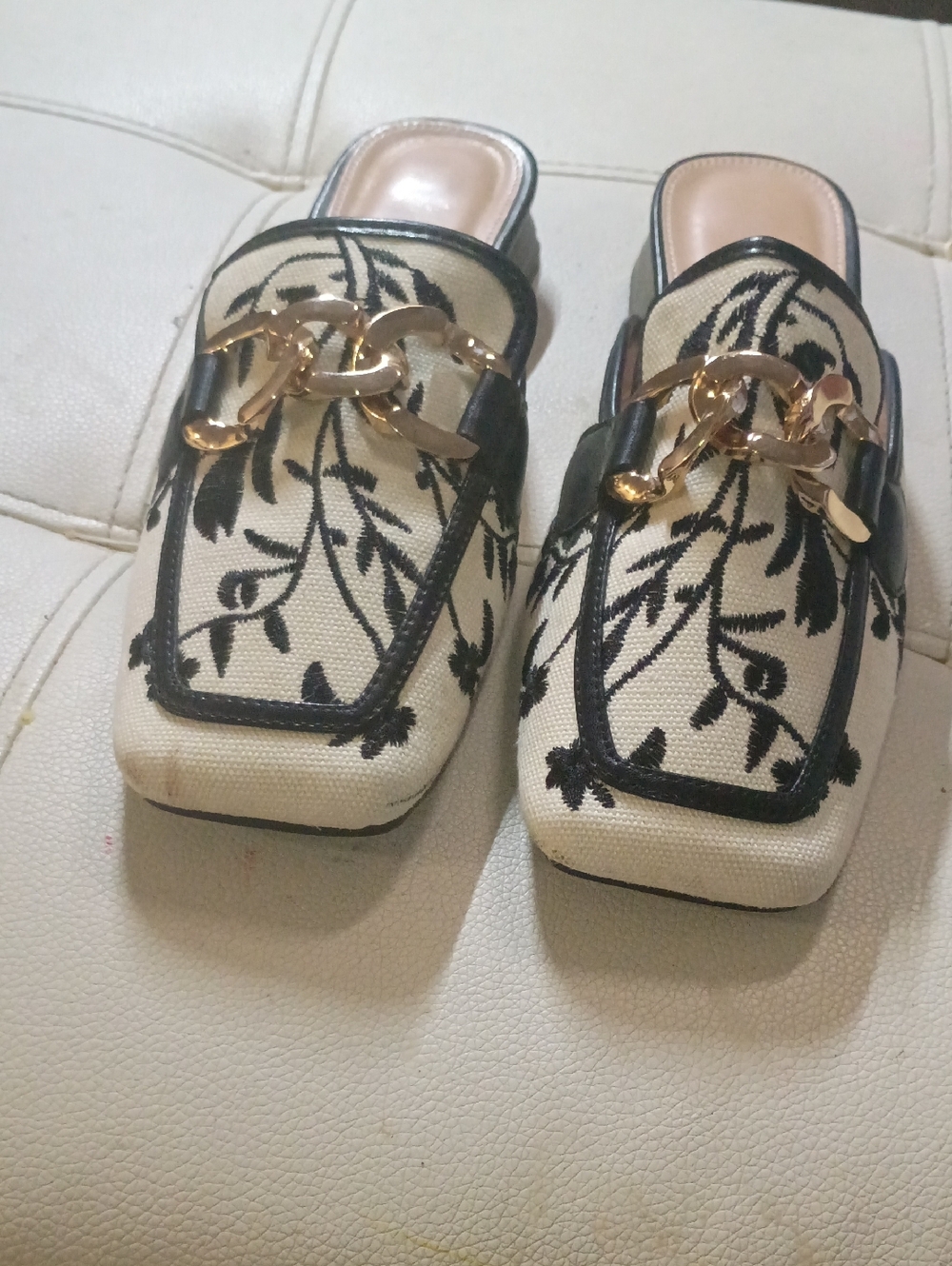 Cream Embroidered Slip-On Mules with Gold Chain Accent